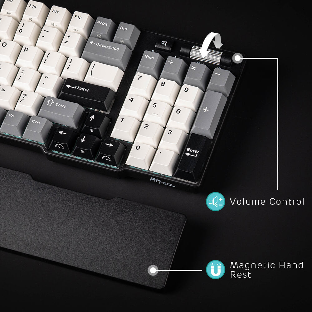 Mechanical keyboard with volume control and magnetic hand rest on a black background