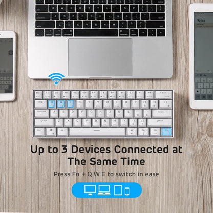 Royal Kludge RK61 keyboard connected to multiple devices, showcasing its ability to connect up to 3 devices simultaneously. Press Fn + Q, W, E to switch between devices easily